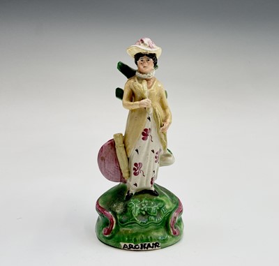 Lot 336 - An early 19th century Staffordshire pottery...