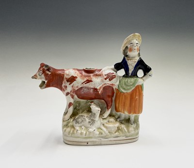 Lot 339 - A Staffordshire pottery cow creamer, circa...