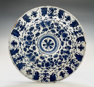 Lot 340 - A Dutch Delft blue and white charger, 18th...