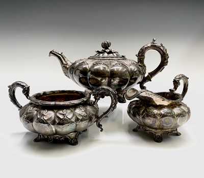 Lot 374 - A George IV ornate three-piece silver tea...