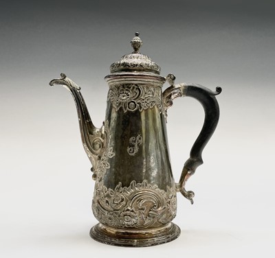 Lot 359 - A George II silver bellied ornate coffee pot...