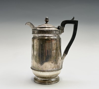 Lot 444 - A George IV silver hot water jug with plain...