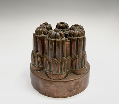 Lot 351 - A Victorian copper jelly mould, height 12.5cm,...