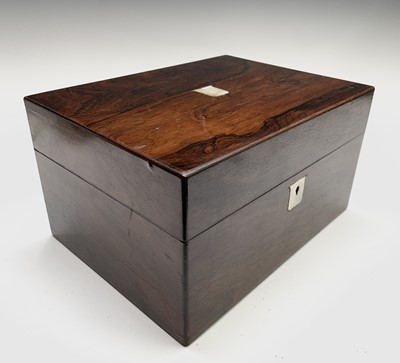 Lot 55 - A Victorian rosewood veneered toilet case with...