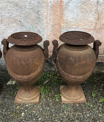 Lot 559 - A pair of classical style garden urns, cast...