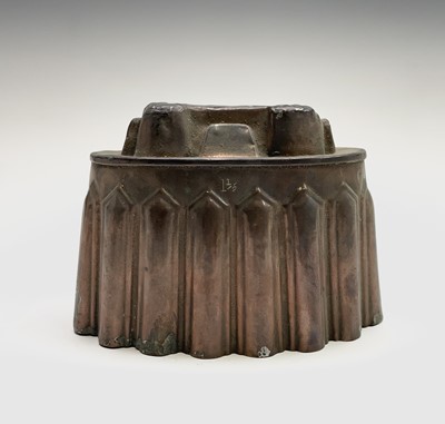 Lot 357 - A Victorian copper jelly mould, impressed mark...