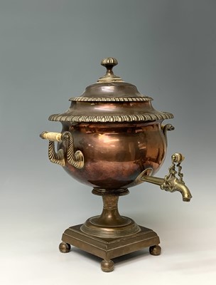 Lot 358 - A Regency copper tea urn, with brass tap,...