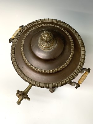 Lot 358 - A Regency copper tea urn, with brass tap,...