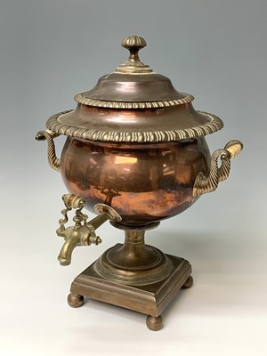 Lot 358 - A Regency copper tea urn, with brass tap,...