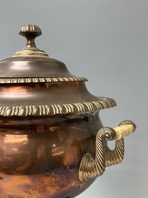 Lot 358 - A Regency copper tea urn, with brass tap,...
