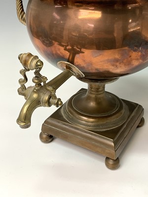 Lot 358 - A Regency copper tea urn, with brass tap,...