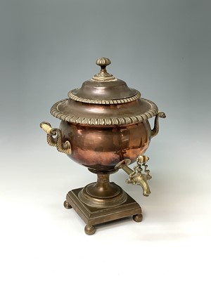 Lot 358 - A Regency copper tea urn, with brass tap,...