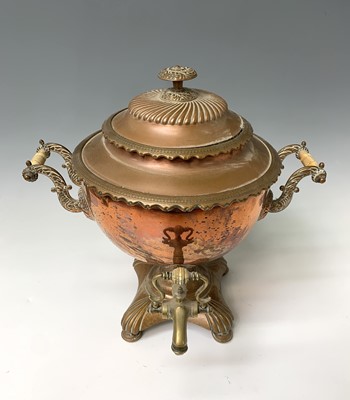 Lot 359 - A Regency copper tea urn, height 40cm, width...