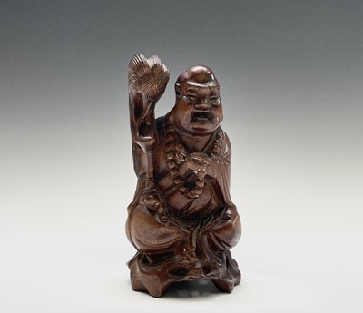Lot 416 - A Chinese carved hardwood figure of buddha,...
