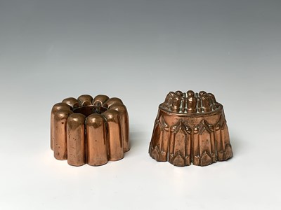 Lot 361 - Two Victorian copper jelly moulds, height 13,...