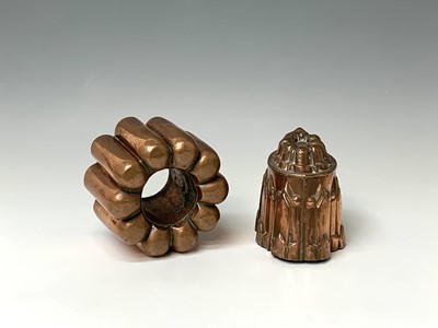 Lot 361 - Two Victorian copper jelly moulds, height 13,...