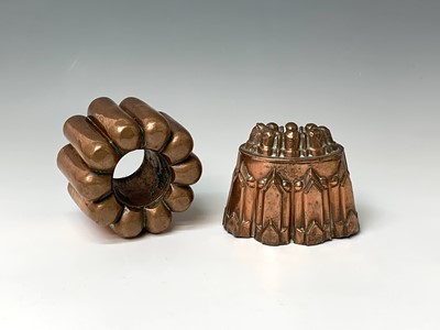 Lot 361 - Two Victorian copper jelly moulds, height 13,...