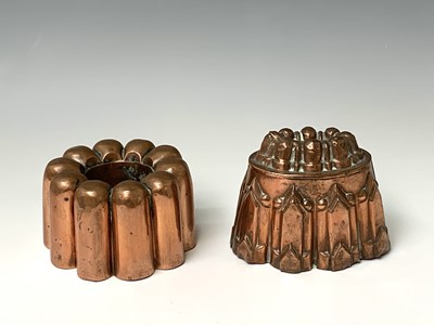 Lot 361 - Two Victorian copper jelly moulds, height 13,...