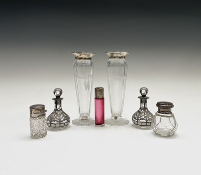 Lot 346 - A pair of silver encased pear-shape perfume...