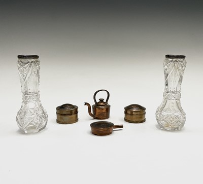 Lot 223 - Four miniature objects made from pennies...