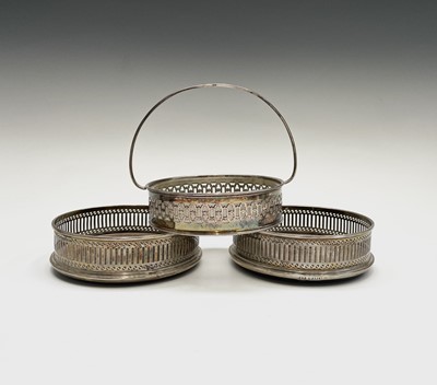 Lot 412 - A pair of pierced silver wine coasters by...