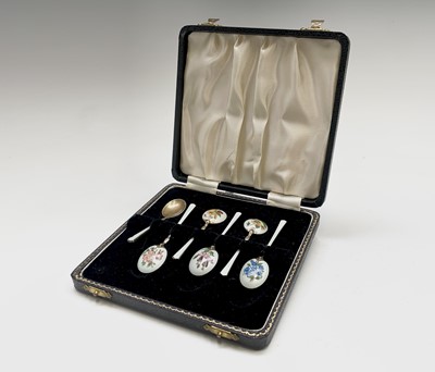 Lot 391 - A set of six silver botanical enamelled coffee...