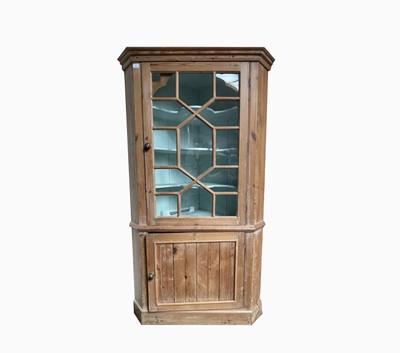 Lot 380 - A 19th century pine standing corner cupboard,...