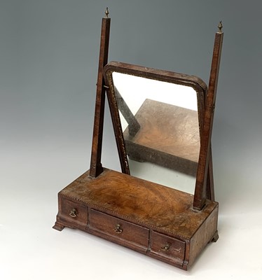 Lot 375 - An early 18th century figured walnut toilet...