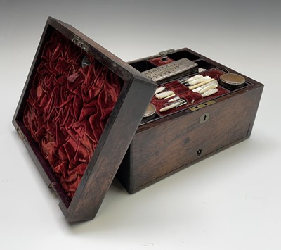 Lot 67 - A Victorian dressing case, the interior fitted...