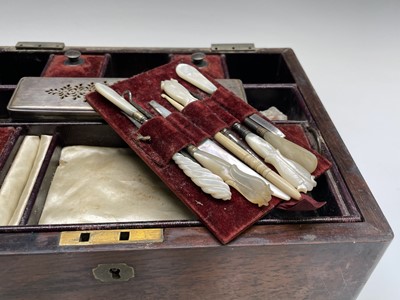 Lot 67 - A Victorian dressing case, the interior fitted...