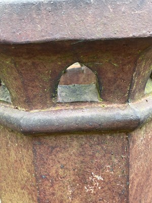 Lot 394 - A terracotta octagonal chimney pot with...
