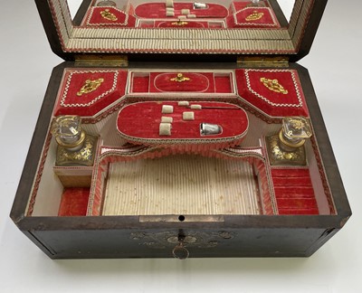 Lot 68 - A 19th century ebony and brass inlaid lady`s...