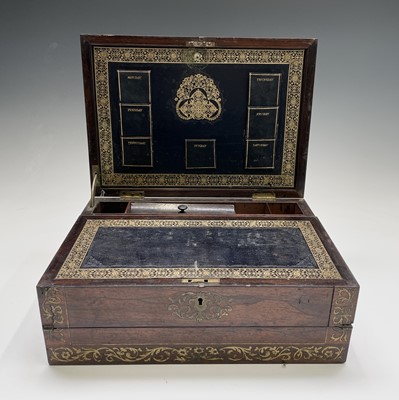 Lot 70 - An early Victorian rosewood and brass inlaid...