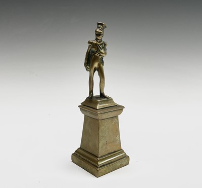 Lot 71 - A Regency gilt bronze figure of a cherubic...