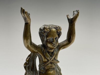 Lot 71 - A Regency gilt bronze figure of a cherubic...