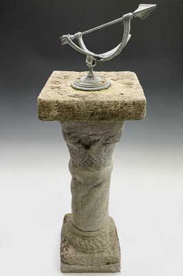 Lot 403 - A bronzed sundial mounted on a reconstituted...