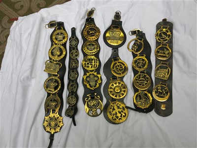 Lot 218 - A large collection of horse brasses - some on...