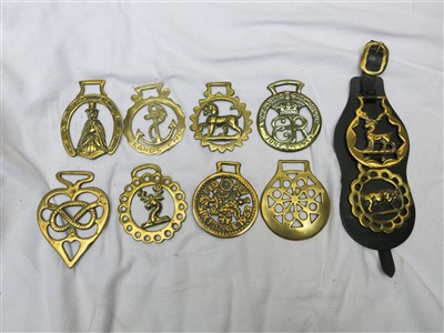 Lot 218 - A large collection of horse brasses - some on...