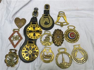 Lot 218 - A large collection of horse brasses - some on...