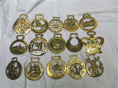 Lot 218 - A large collection of horse brasses - some on...