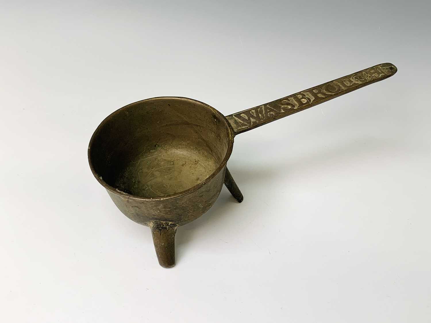 Lot 423 - An 18th century bronze skillet, the handle...