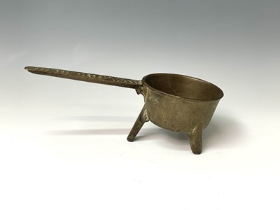 Lot 423 - An 18th century bronze skillet, the handle...