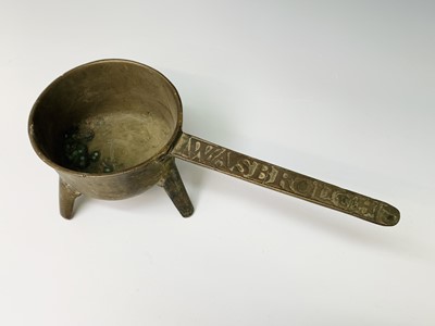 Lot 423 - An 18th century bronze skillet, the handle...