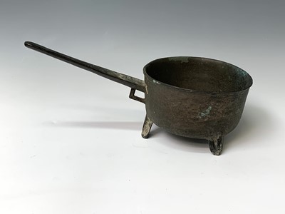 Lot 425 - A 17th century bronze skillet, apparently...