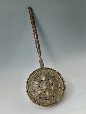 Lot 428 - An English brass warming pan, 17th century,...