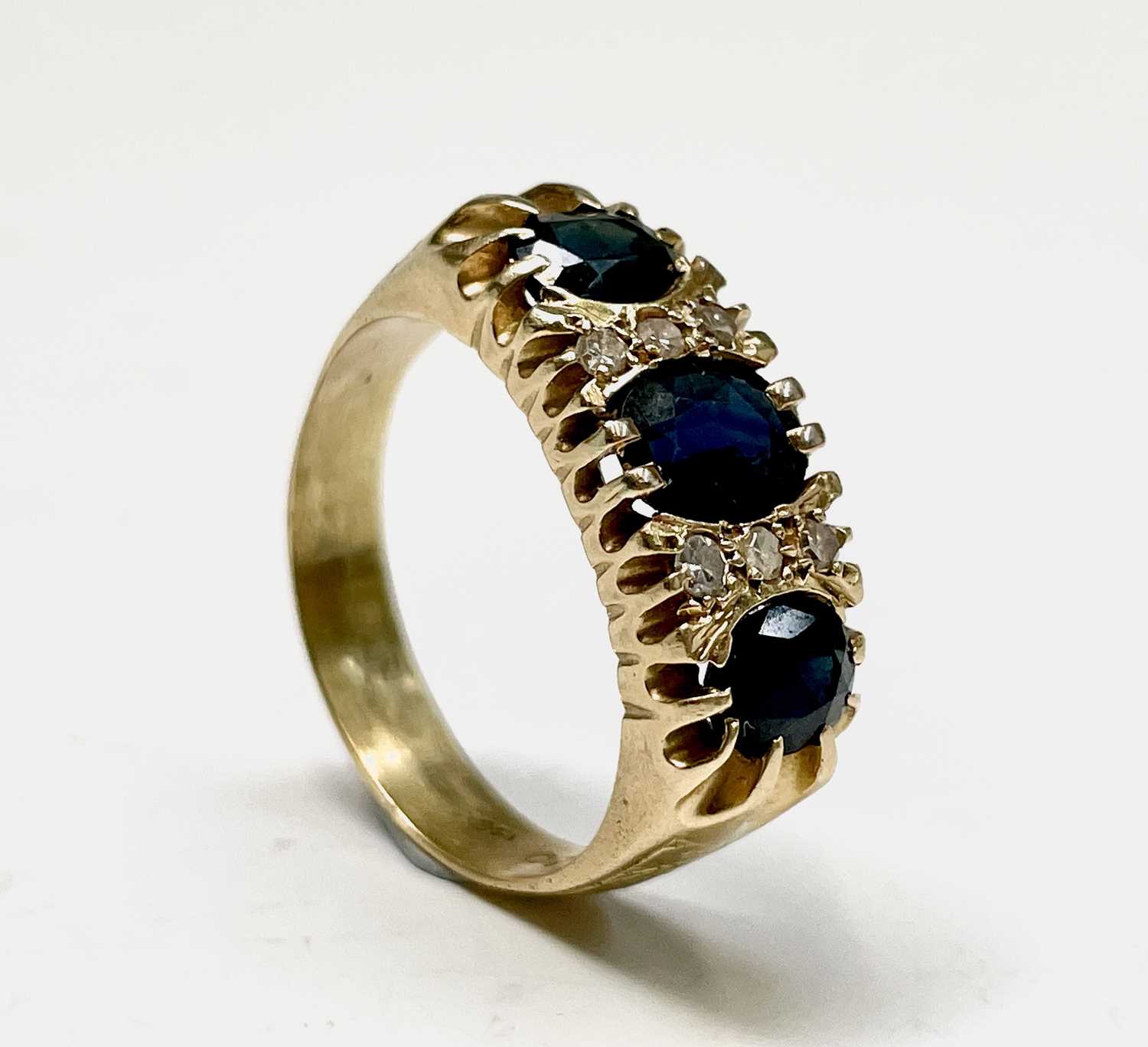 Lot 15 - An 18ct gold Victorian style ring set with...