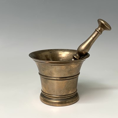 Lot 430 - An 18th century bronze pestle and mortar,...