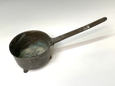 Lot 432 - An 18th century bronze skillet, the handle...