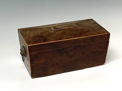 Lot 435 - A burr yew tea caddy, early 19th century,...