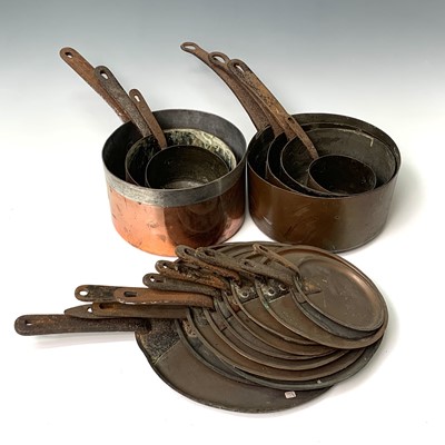 Lot 441 - Seven Victorian copper pans, each with iron...